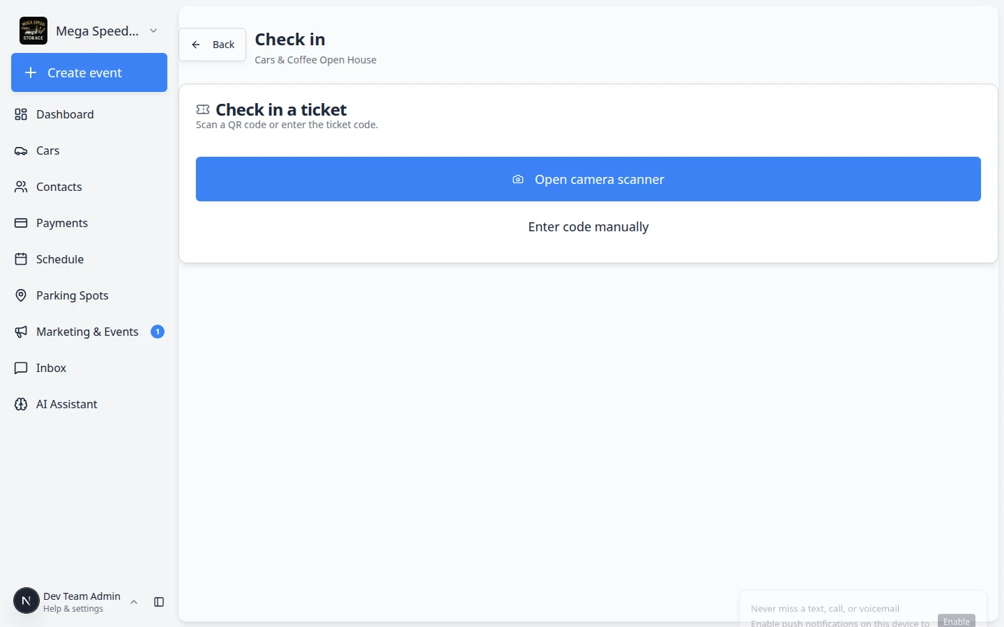 Event check-in page with Open camera scanner button and Enter code manually link below the event title
